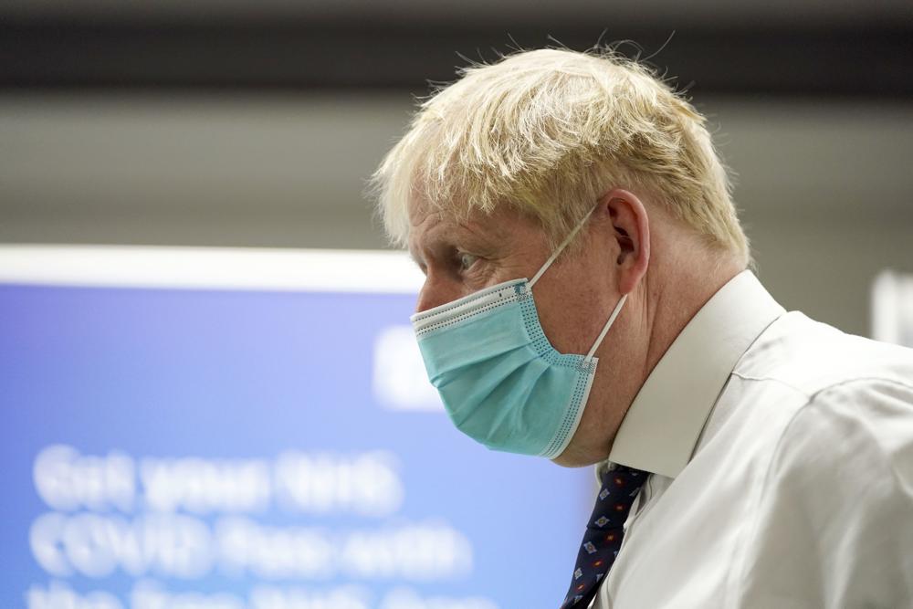  Britain's Prime Minister Boris Johnson visits a vaccination hub